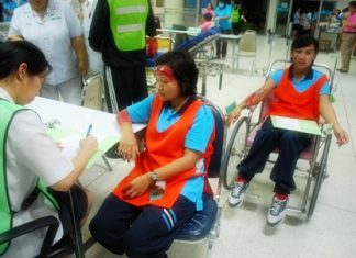 Actresses play their roles as injured tourists during the training exercises.